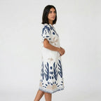 Vestido midi túnica | Corte amplo, linho branco | Conforto elegante