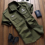 Greta | Camisa Masculina Manga Curta Bolsos Cargo